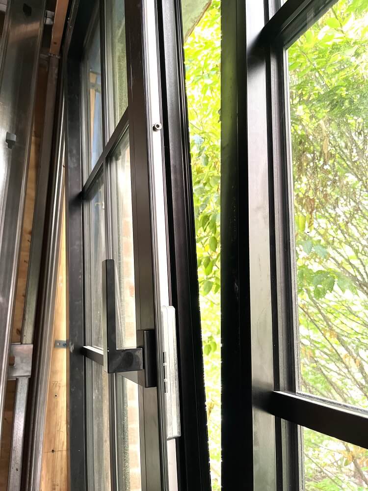 European tilt and turn windows Aluprof with grilles in New York