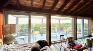long island beach house with white European aluminum sliding doors